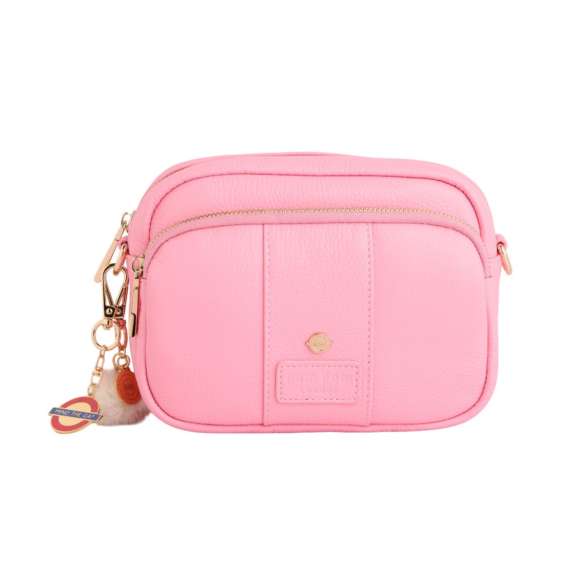 Pink crossbody bag with a keychain on a white background